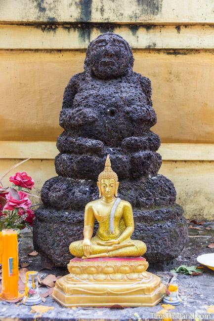laterite carving of Phra Sangkajai at Ku Mithila Khmer ruin