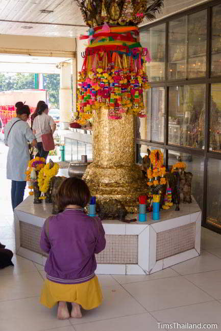 Replica city pillar covered in gold leaf at current Khon Kaen city pillar shrine