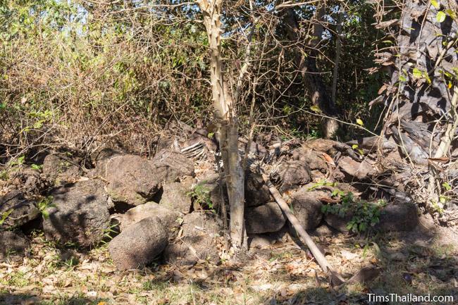 pile of blocks behind Ku Phanna Khmer ruin