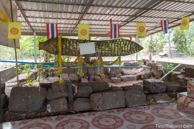 Ku Sampan Ka Khmer ruin with good luck fish trap hanging in front