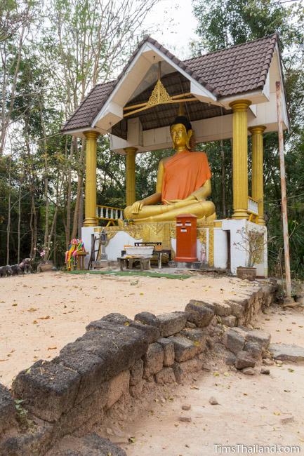 large buddha image at ku ban non ku khmer ruin