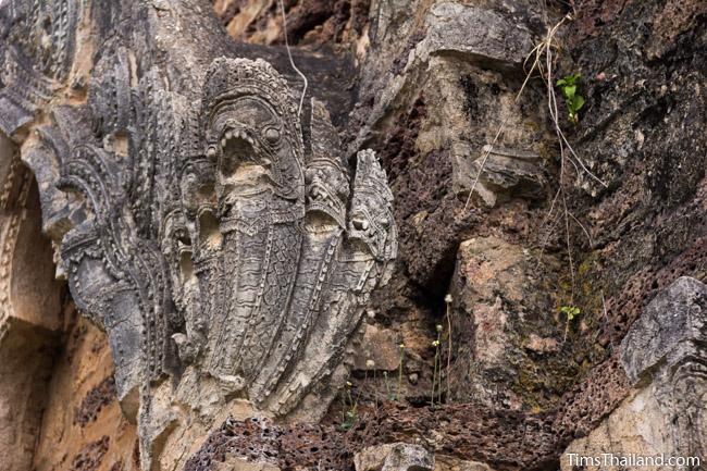 stucco naga at prang wat chulamani khmer ruin