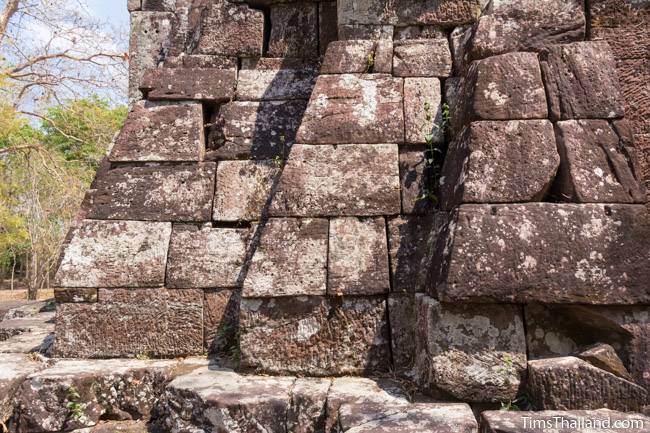 sloped wall with redented corners at Phra That Phu Phek Khmer ruin