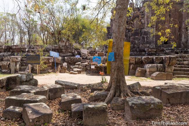 signs next to Phra That Phu Phek Khmer ruin