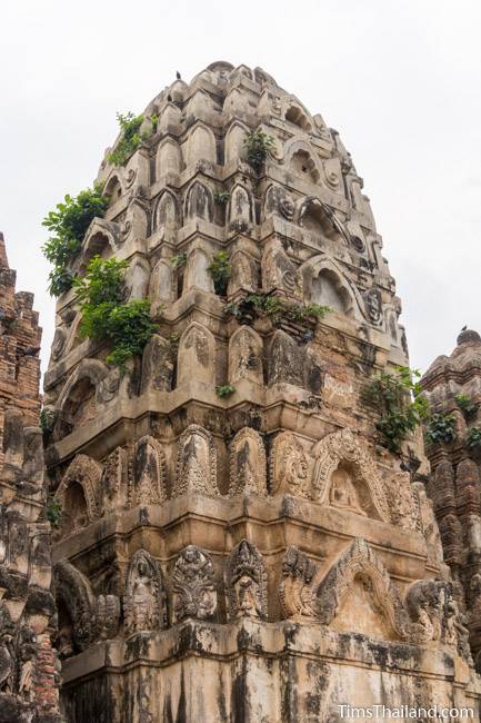 stucco on tower of Wat Si Sawai Khmer ruin