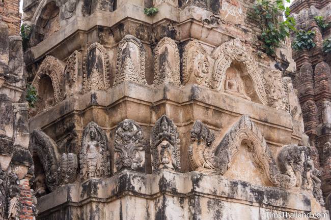 stucco on tower of Wat Si Sawai Khmer ruin