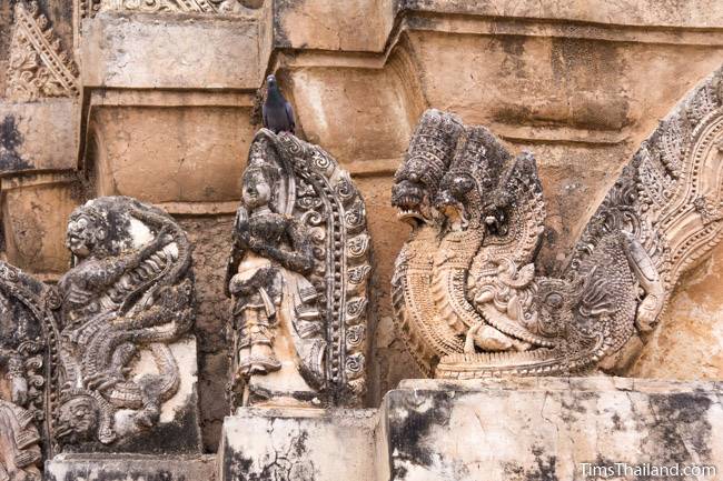 stucco on tower of Wat Si Sawai Khmer ruin