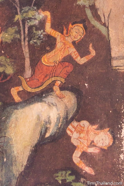 mural painting of Bodhisatta's wife pushing him off the cliff from the Culla-Paduma Jataka in ubosot of Wat Thung Si Muang