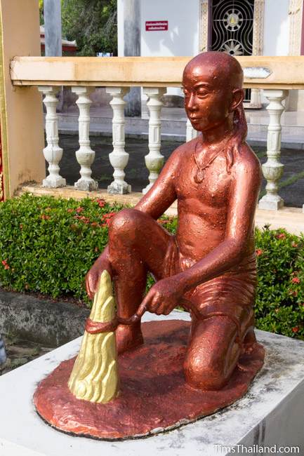 statue of boy from Luang Por Phra Phut Buddha image legend