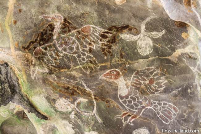 painting of birds and flowers at Tham Sam cave