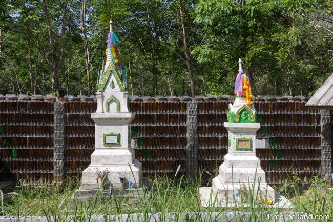 Wat Khuat bottle temple's bottle wall and funerary stupas