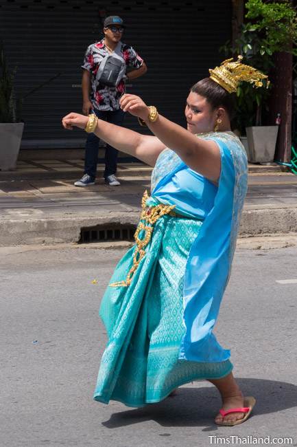 man in traditional Thai woman's dress in Khao Phansa candle parade