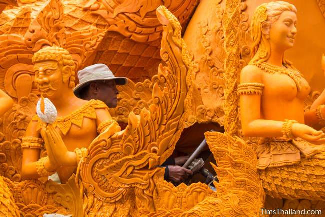 man driving Khao Phansa candle parade float