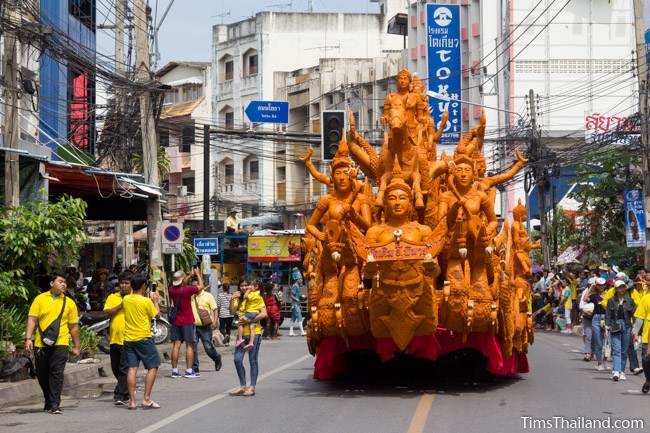 Khao Phansa candle parade float driving down the street