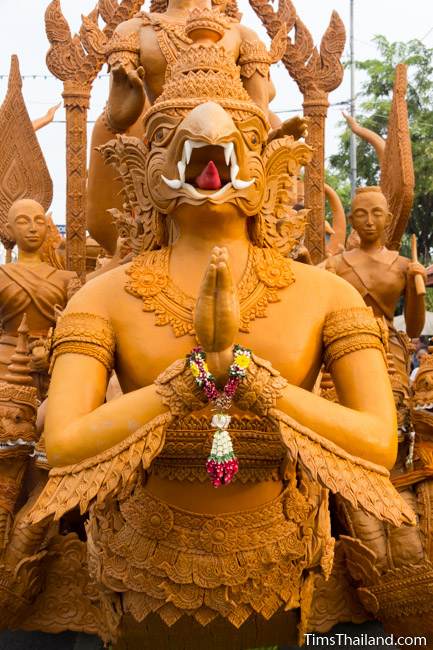 garuda on the front of a Khao Phansa candle parade float