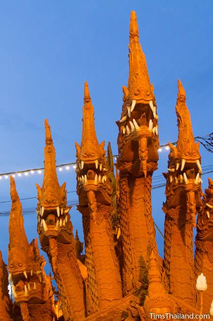 naga heads on a Khao Phansa candle parade float