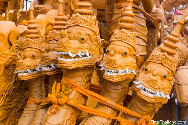 naga heads on a Khao Phansa candle parade float