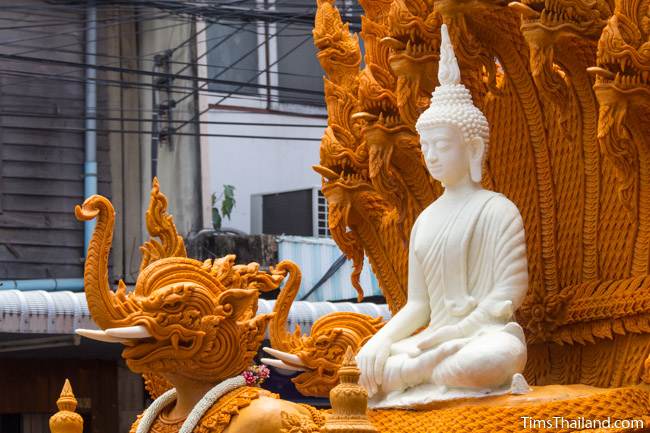 white Buddha on a Khao Phansa candle parade float