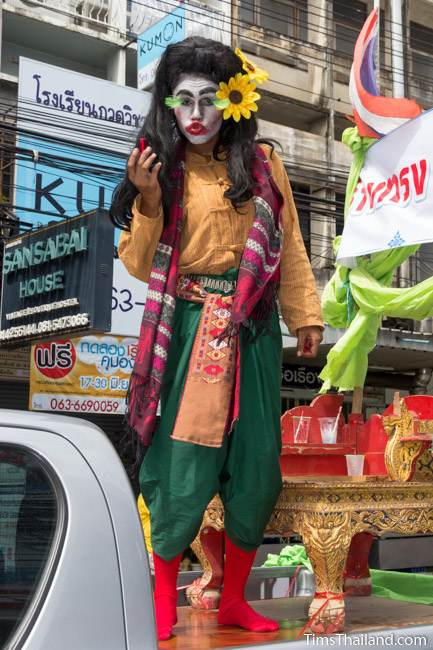 man dressed as a ghost in the Khao Phansa candle parade