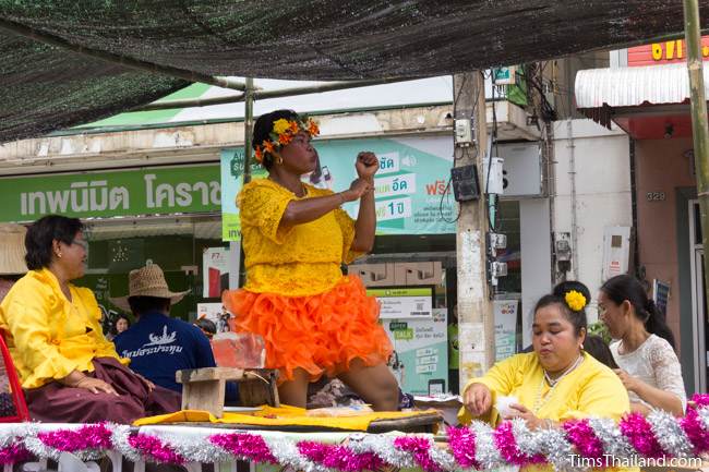 woman dancing in a Khao Phansa candle parade