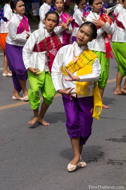 young women dancing in a Khao Phansa candle parade