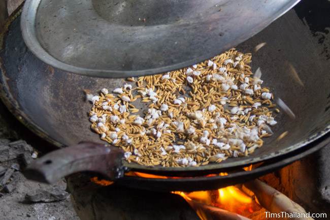 puffed rice popping in a pan