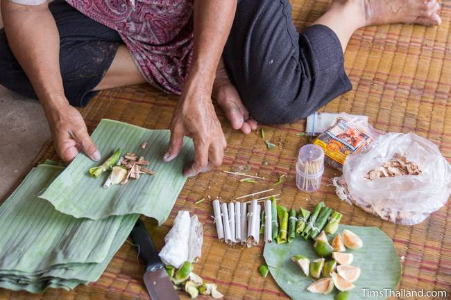 preparing betel nut during Boon Khao Pradap Din