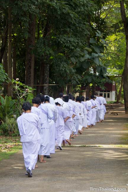 people doing walking meditation during Ok Phansa