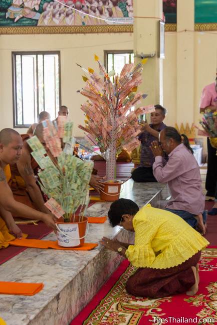 presenting money to monks for Kathin celebration