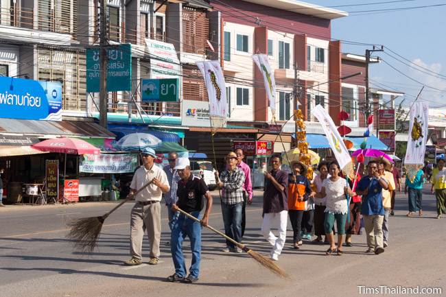 people walking in Kathin celebration parade