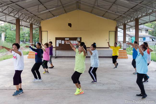 women practicing dancing for Kathin celebration