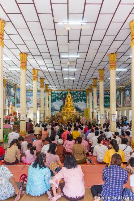 people sitting in temple for Kathin celebration