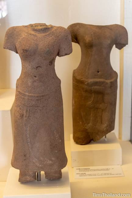 headless and armless bodies of devi goddess and male figure from Phanom Rung Khmer ruin at Maha Viravong National Museum