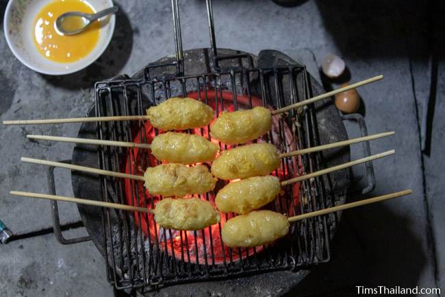 grilled khao jee sticky rice with egg at Boon Berk Bahn