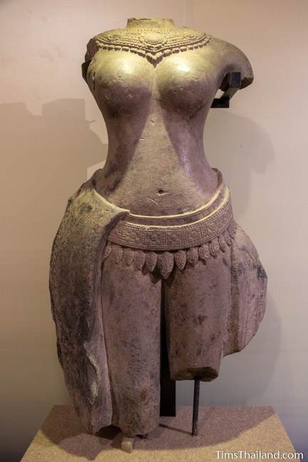 headless and limbless female deity stone carved statue