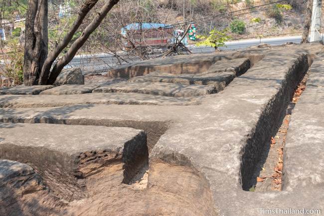 sandstone blocks not yet removed next to highway