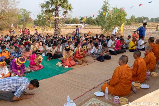 people sitting in front of monks