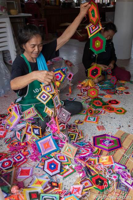 woman sorting decorations