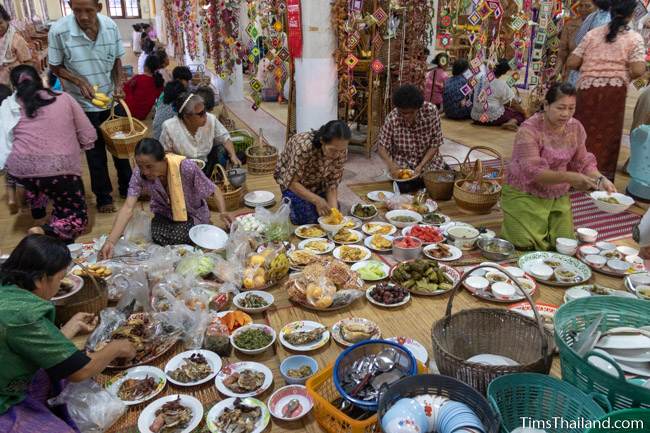 people preparing to serve food