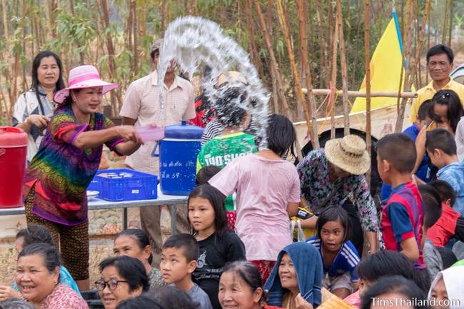 woman throwing water