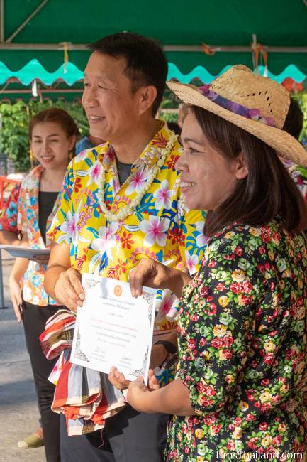 teacher receiving certificate