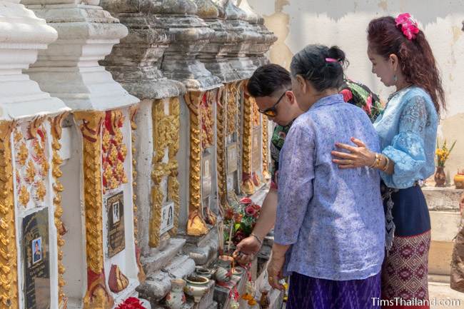 family with ancestor vault at temple