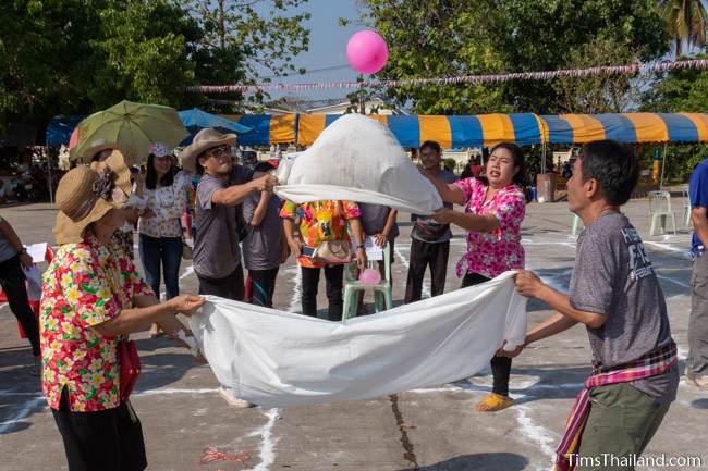 tossing water balloons