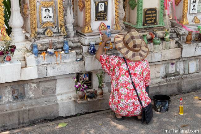 women with ancestor vault at temple