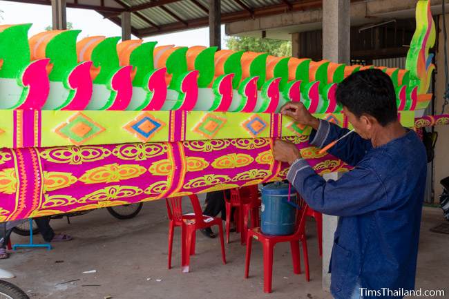 decorating a colorful parade float