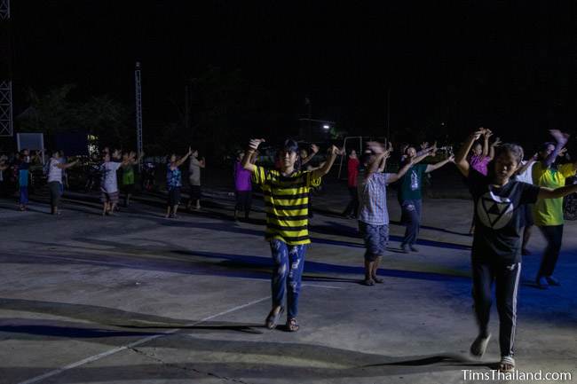 women dancing at night