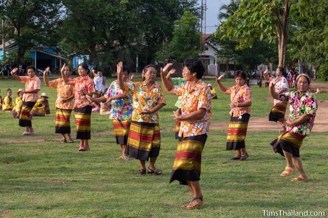 women dancing in the park after the parade