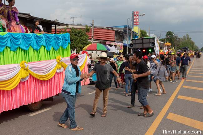 people dancing in the parade