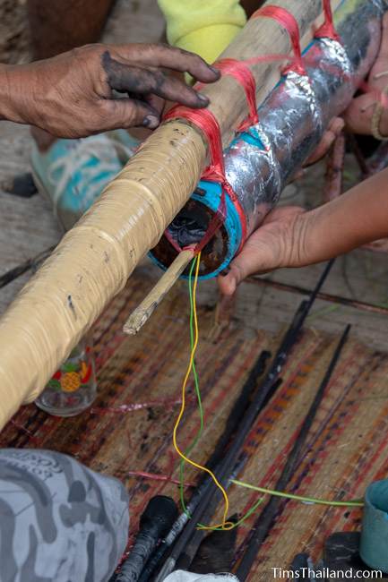 wires sticking out of the bottom of a rocket