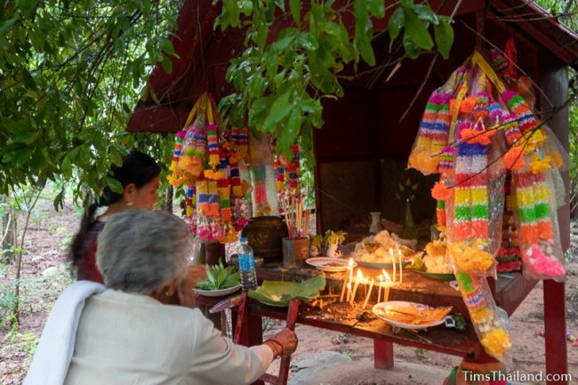 candles burning on a shrine